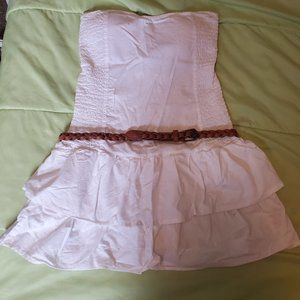 One Step Up-Short sleeveless white dress and a braided belt